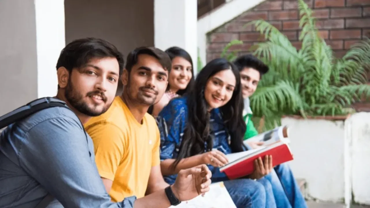 young-asian-indian-college-students-reading-600nw-1840890862
